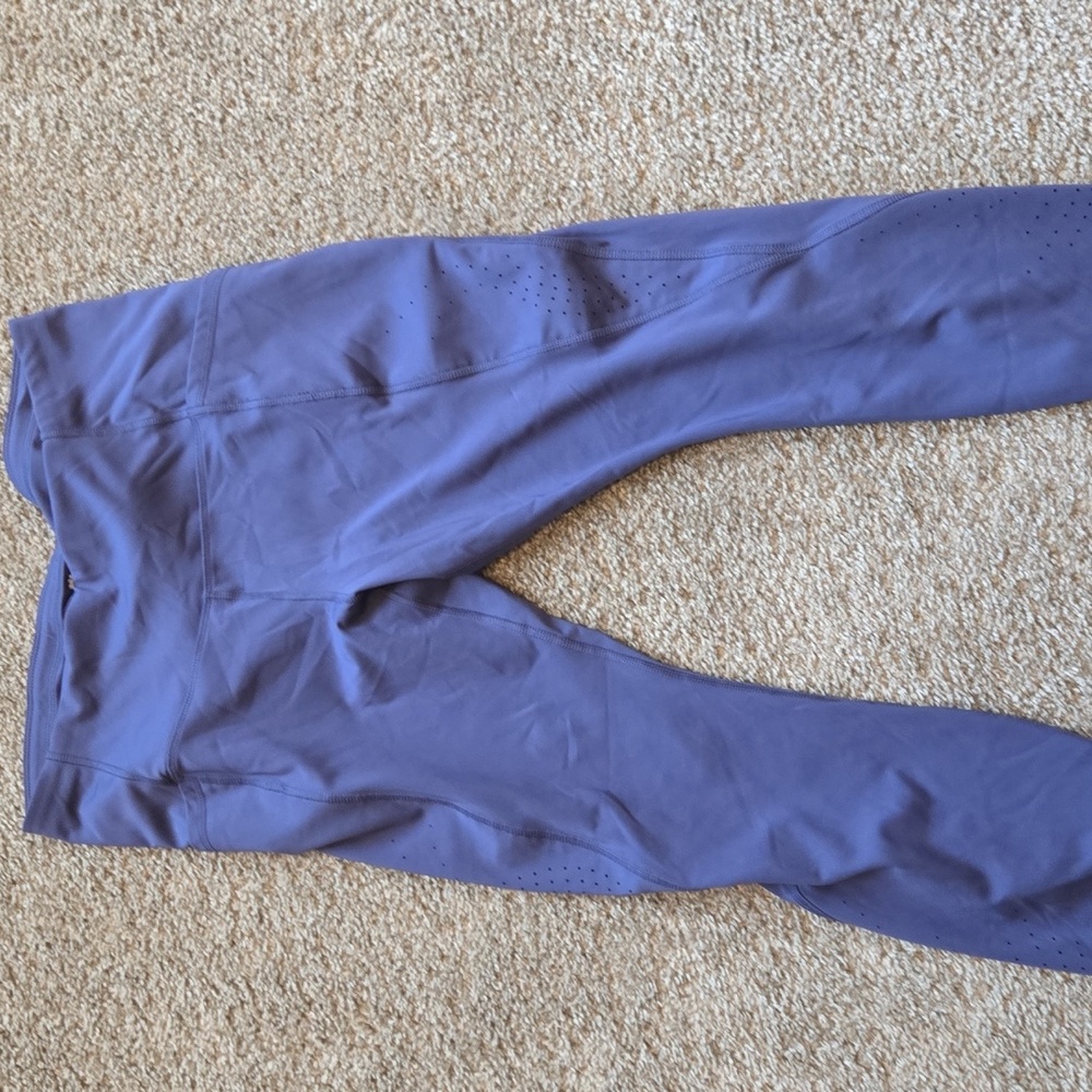 All in motion leggings.  Size Large. Dark purple blue in color. Worn once